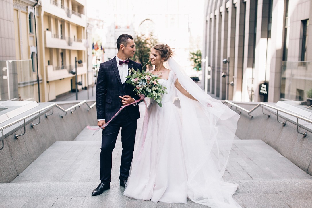 Couple Enjoying Wedding Photo Retouching After